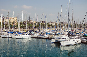 Fototapeta na wymiar A lot of yachts in the port of Barcelona, Spain