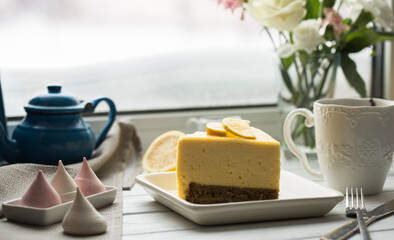 Lemon mouse cake. A slice of lemon cheesecake.