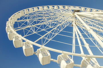 White ferris wheel on the sky