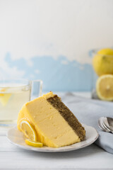 Dessert - Lemon mouse  Cheesecake. A slice of citrus cake with lemon and orange. half a lemon cake. cutaway lemon cake. sponge cake