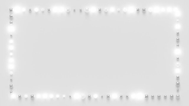 Rectangular Frame Of Spheres Loop 2 Silver x White: many silver and flashing white spheres animated along a rectangular shape, with empty white space in the center. Copy space area. Seamless loop.