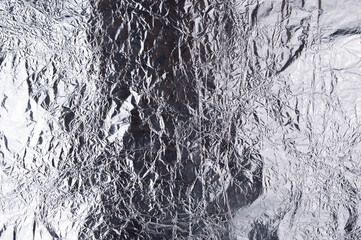 close up of Silver crumpled foil texture background