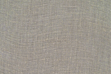 Grunge texture linen fabric.  Natural background for design. monochrome background of rough canvas