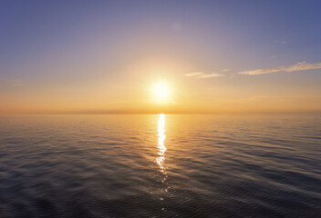 Naklejka premium Sunset in the open sea. Aerial view.