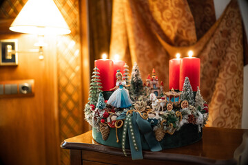 Advent wreath with candles, table handmade arrangement mini decoration for new year, artificial Christmas tree interior decoration