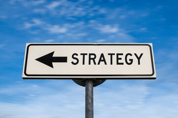 Strategy road sign, arrow on blue sky background. One way blank road sign with copy space. Arrow on a pole pointing in one direction.