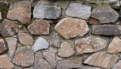 Texture of an old wall made of natural stone