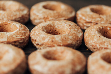 Beautiful Bagels and Gingerbreads Lie on a Brown Background