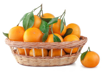 Fresh tangerines in a basket isolated on white
