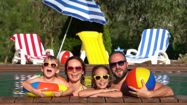 Happy family having fun on summer vacation