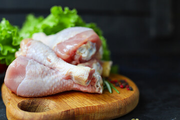 fresh raw chicken drumsticks meat for cooking on the table healthy meal snack top view copy space for text food background rustic keto or paleo diet