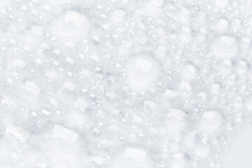 Obraz premium Foam bubble from soap or shampoo for washing isolated on white background from above