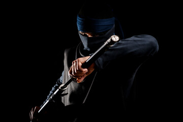 Ninja warrior in the dark with sword © patrick