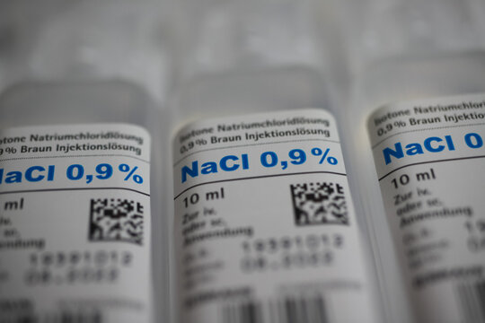 Viersen, Germany - May 9. 2020: Macro close up of isolated 10 ml nacl sodium chloride 0,9 % infusion solution ampules