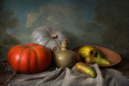 Still life with pumpkins and pears
