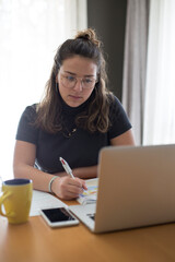 A student taking an online class from home