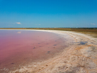 Fototapeta na wymiar Aerial view to pink salt lake. Sasyk-Sivash pink salt lake in Crimea.