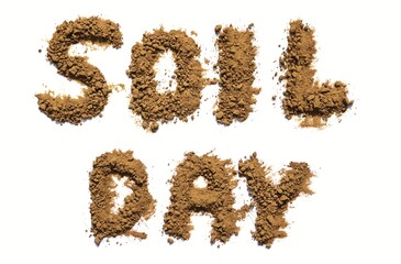 Soil Day Written with Dry Soil on White Background