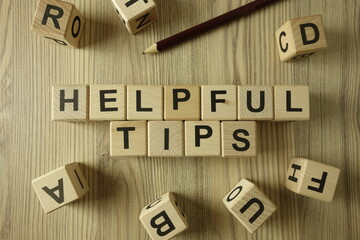 Text helpful tips from wooden blocks