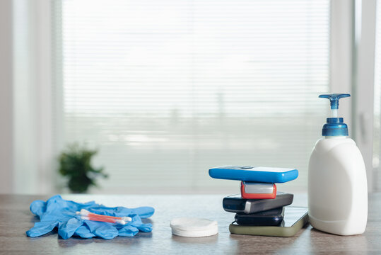 Coronavirus prevention equipment. Set of items for cleaning mobile phones, disinfection of items of frequent use