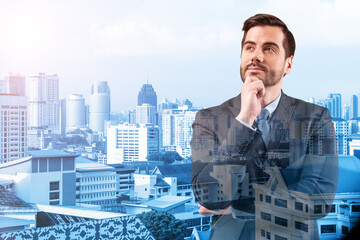 Young handsome businessman in suit with hand on chin thinking how to succeed, new career opportunities, MBA. Kuala Lumpur on background. Double exposure.