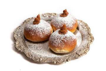 Hanukkah donuts on a vintage plate
