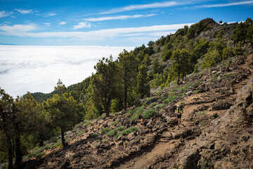 man running on the mountain trail on canary island la palma