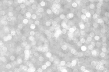 Abstract glowing bright gray background, texture, glitter a vintage glare, bokeh background