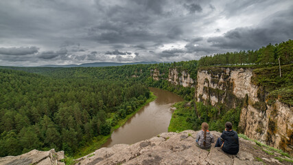 landscape with river, forest and rock on the side