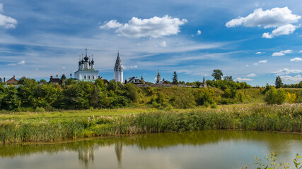 Fototapeta na wymiar old Russian church on the river