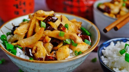 Spicy Fish with dry red chillies and schezwan peppercorn served with Jasmine rice, selective focus