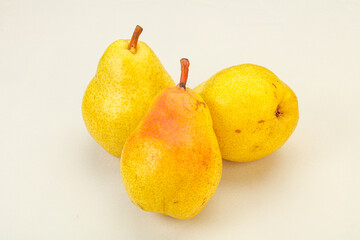Fresh sweet pear over background