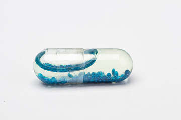 Liquid pill with beads