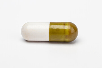 White and green pill