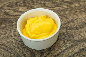 Natural cheese sauce in the bowl