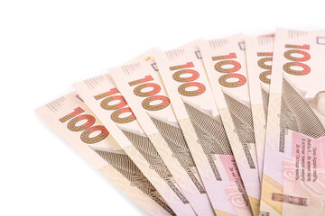 100 Ukrainian Hryvnia banknotes on white background, closeup