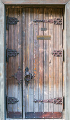 Door of the old wooden private house.