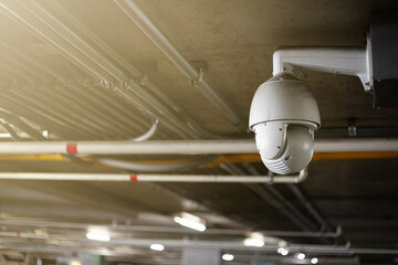 Security system CCTV cameras ceiling mounted under the building, shopping malls, antitheft system and help create a secure digital sight at the parking lot.