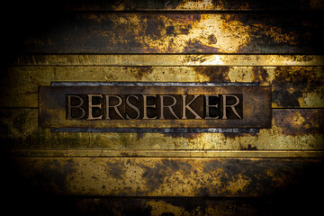 Berserker text formed by real authentic typeset letters on vintage textured grunge bronze background
 - obrazy, fototapety, plakaty