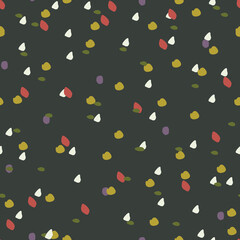 Vector pattern with flecks of orange, yellow, and white on a dark background