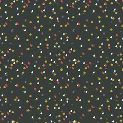 Vector pattern with flecks of orange, yellow, and white on a dark background