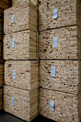 Close-up of stacks of plywood in warehouse