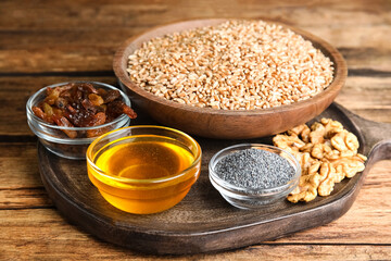 Ingredients for traditional kutia on wooden table