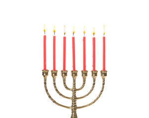 Golden menorah with burning candles on white background
