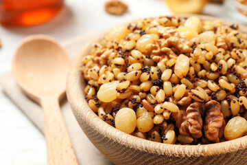 Traditional Christmas slavic dish kutia in bowl on table, closeup