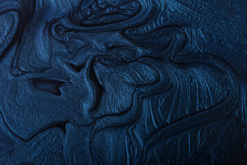 Horizontal navy blue shimmer abstract background. Make up concept.Beautiful stains of liquid nail...