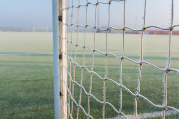 Net on the football goal during winter morning