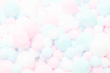 White, pink and blue soft pompons.
