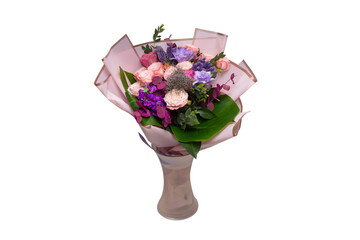 Bouquet of  soft pink flowers in wrapping paper.