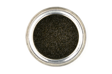 grains of smokeless gunpowder in a jar on a white background
